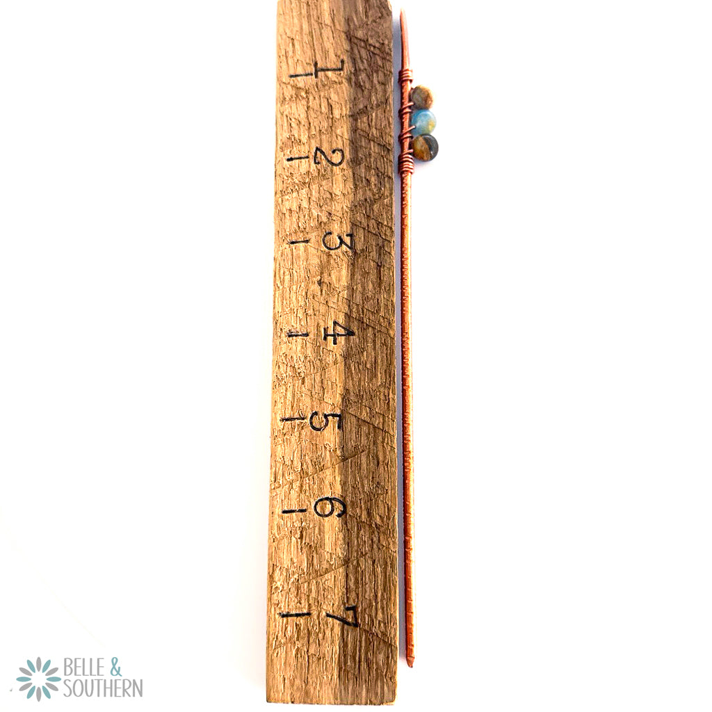 Aquatine Calcite Gemstone Bead textured copper hair stick next to ruler for measurement