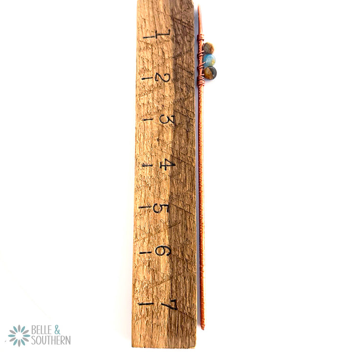 Aquatine Calcite Gemstone Bead textured copper hair stick next to ruler for measurement