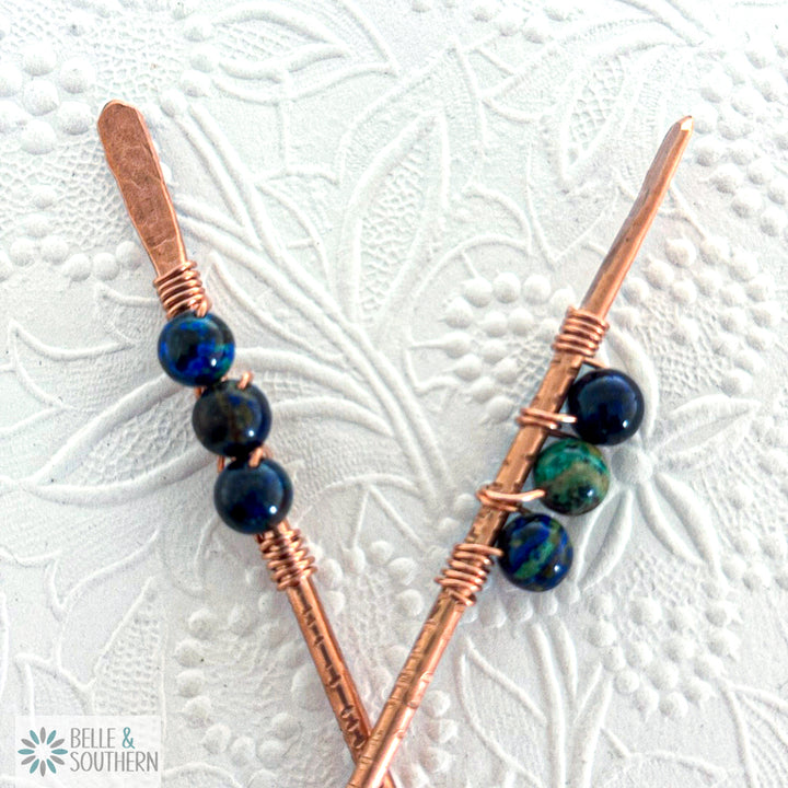 Two copper hair sticks with 3 Azurite Gemstone beads on a textured white background, featuring the brand 'Belle & Southern'.