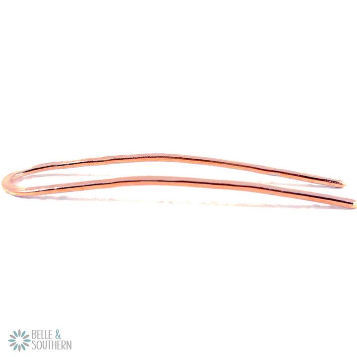 Copper French Pin showing the curve on white background
