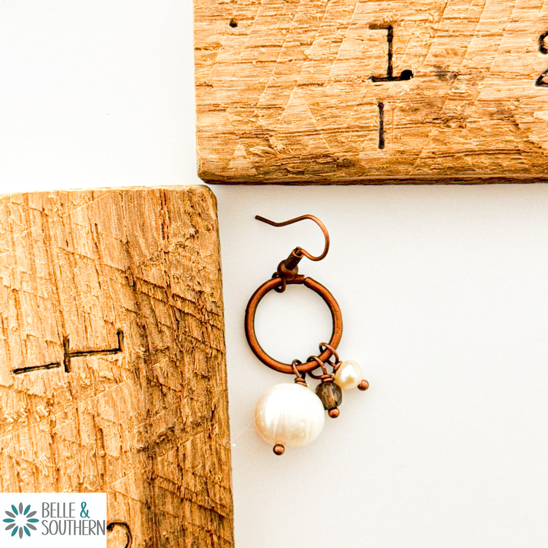 Copper and Pearl Earrings Small Hoop next to ruler
