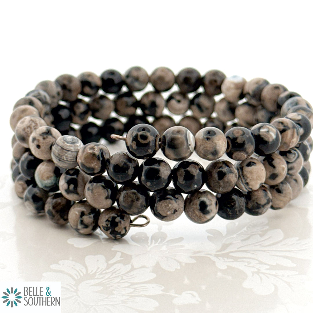 3 layer elastic wrap braclet with tan and black gemstone beads