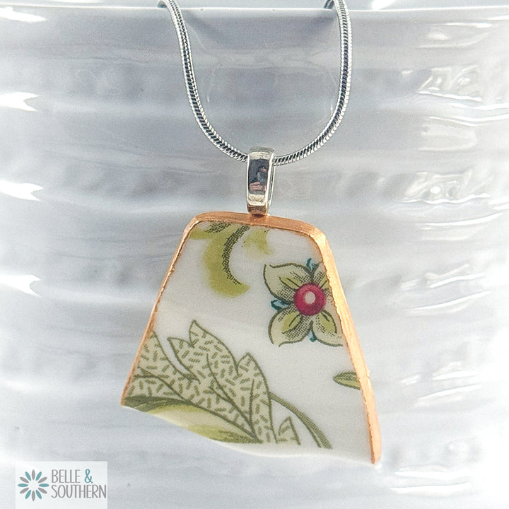 Necklace with a floral pendant on a white background, featuring the brand 'Belle & Southern'.