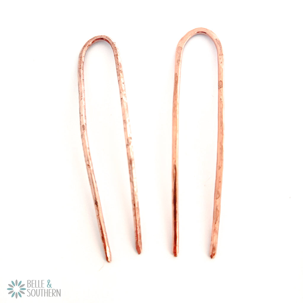 Pair of French Hair Pins on a white surface