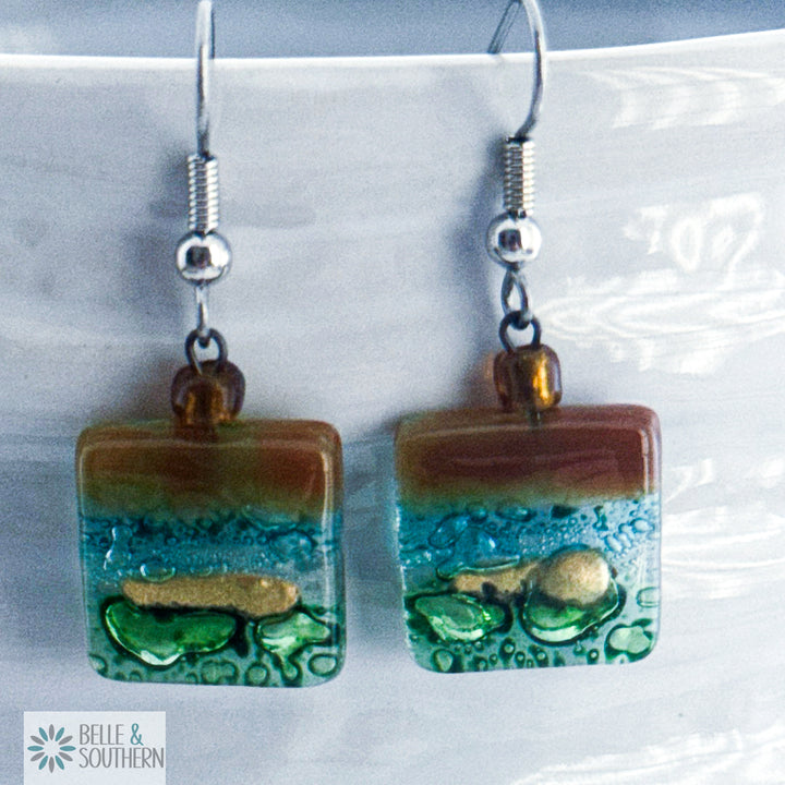 small square colored brown, light blue and green fused glass earrings on stainless steel ear wires
