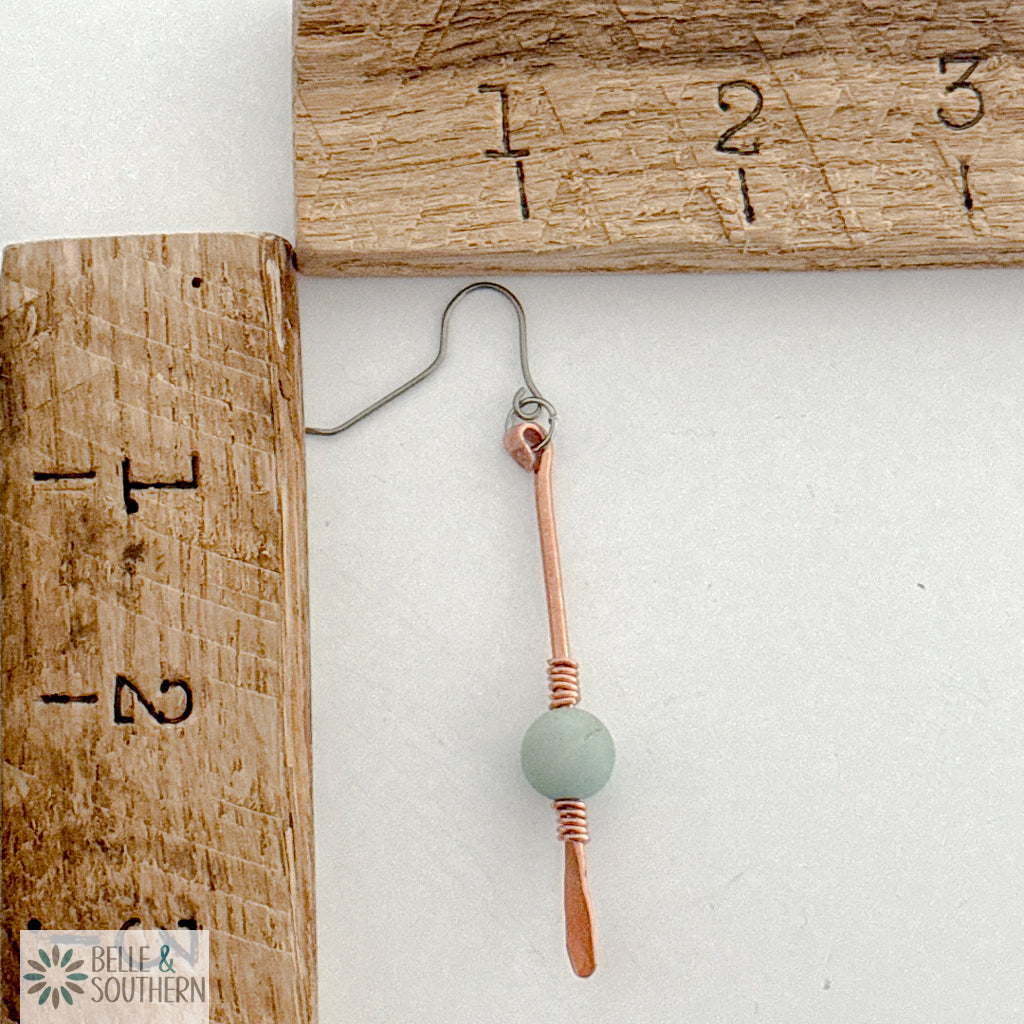 Gem on a Stem Amazonite Earrings beside a ruler for measurement scale