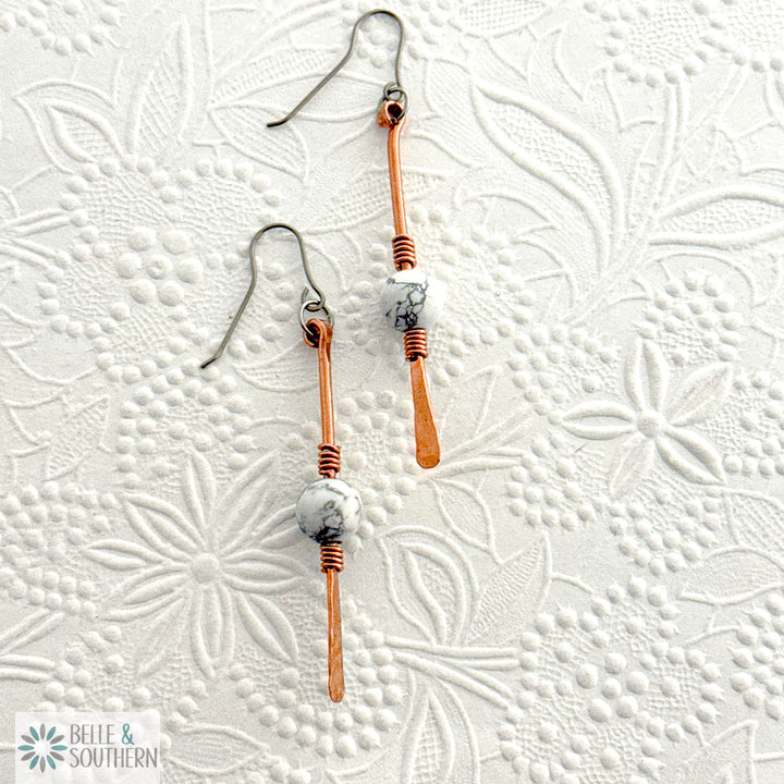 Gem on a Stem Howlite Gemstone Earrings on white embossed background