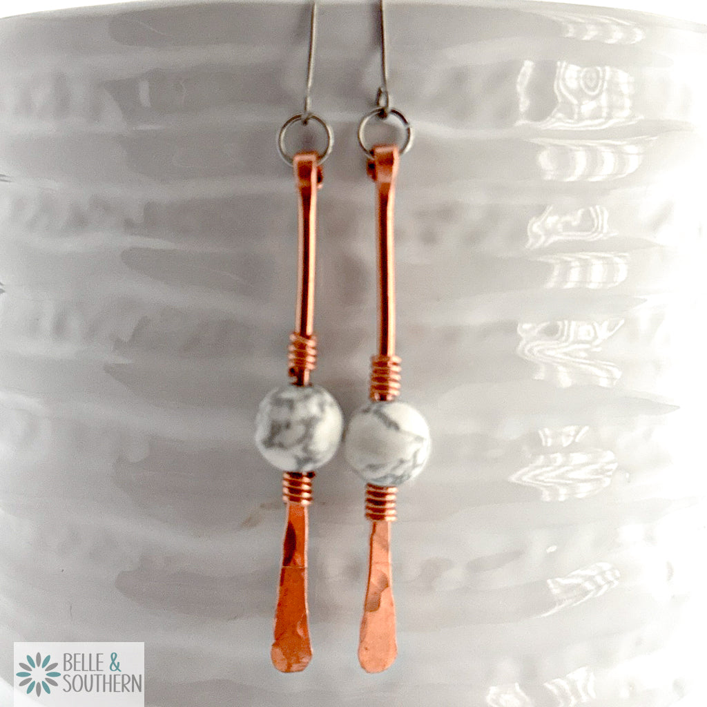 Gem on a Stem copper dangle with Howlite Bead Stone resting on a white vase
