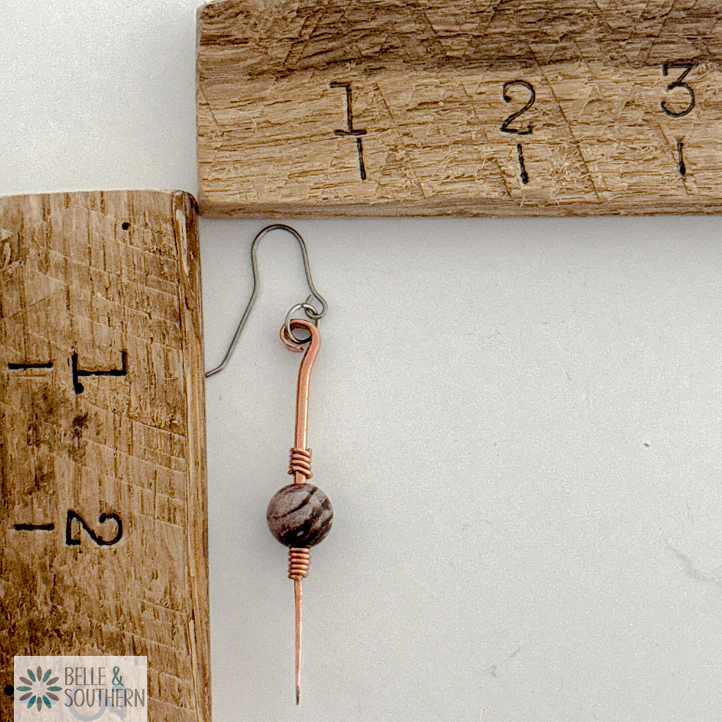 Zebra Jasper gemstone copper dangle earrings by ruler for measurement