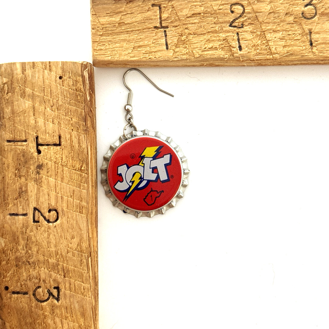 Red, Yellow and White Jolt Bottle Cap on Stainless Steel Ear Wire next ruler