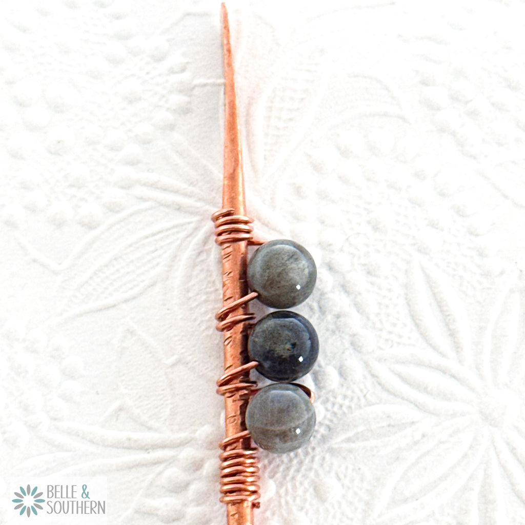 Up close picture of 3 Labradorite Gemstone beads wrapped on textured copper hair stick