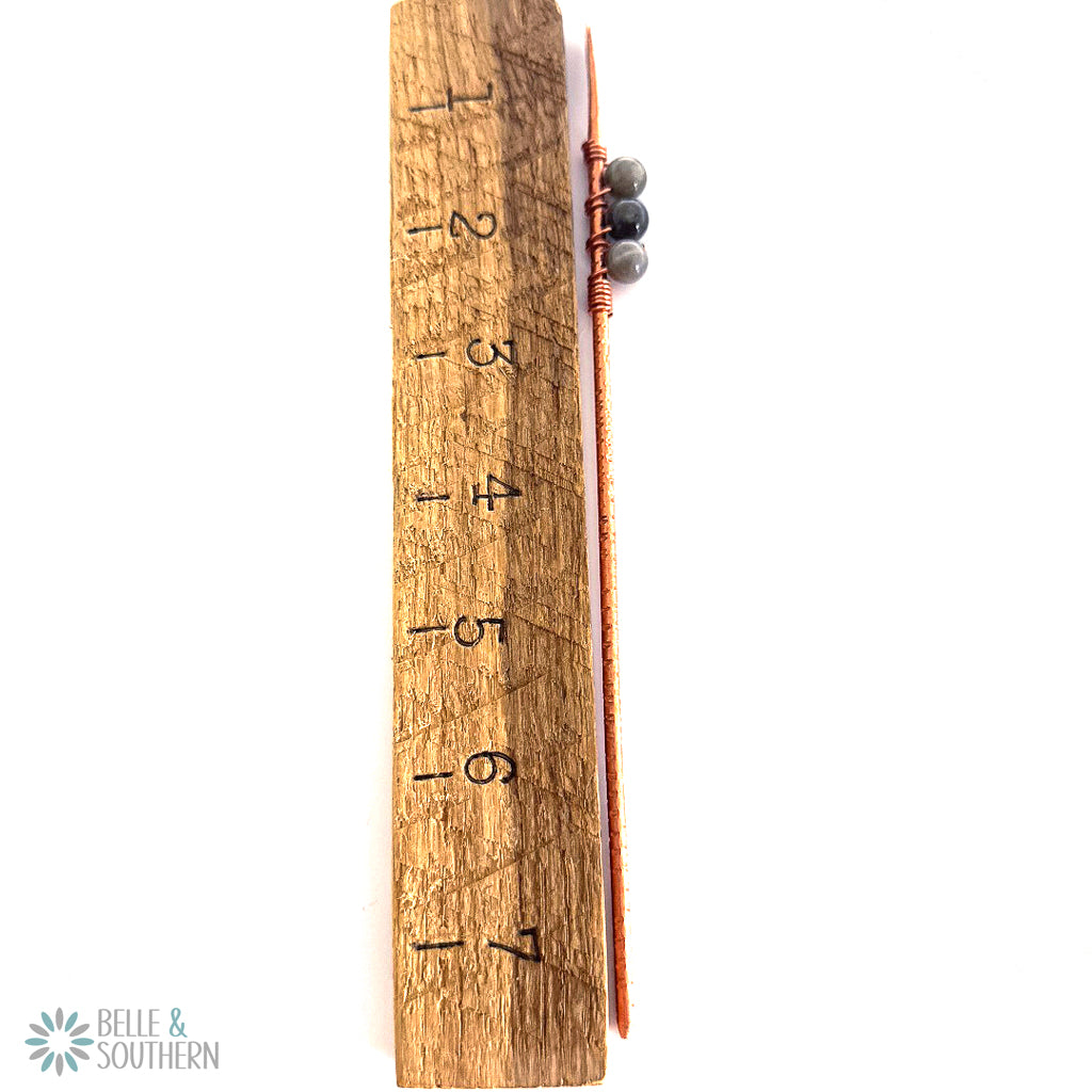Labradorite Gemstone Beads on textured copper hair stick by ruler to reflect measurements
