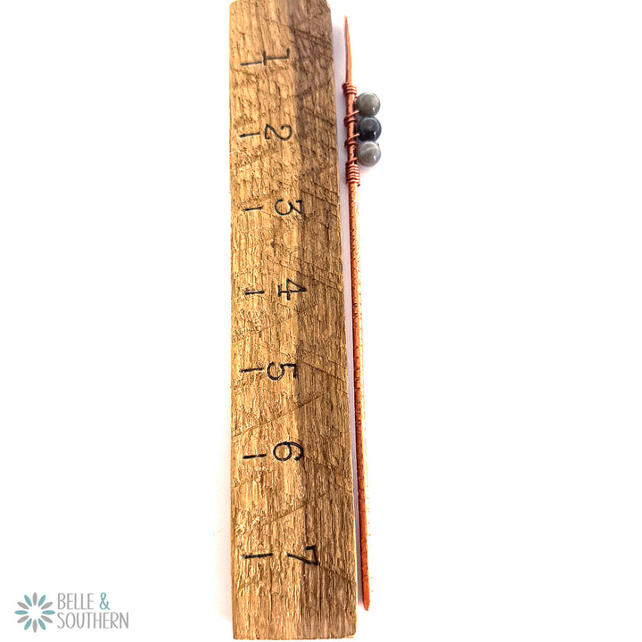 Labradorite Gemstone Beads on textured copper hair stick by ruler to reflect measurements