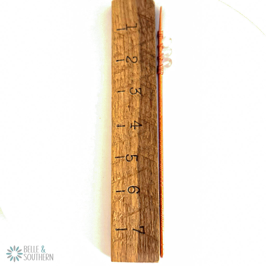 Moonstone Gemstone Beads Wrapped on a Textured Copper Hair Stick next to a ruler for measurement
