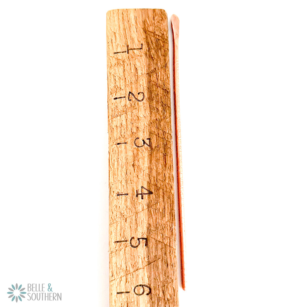 Petite Textured Copper Hair Stick by ruler for measurement
