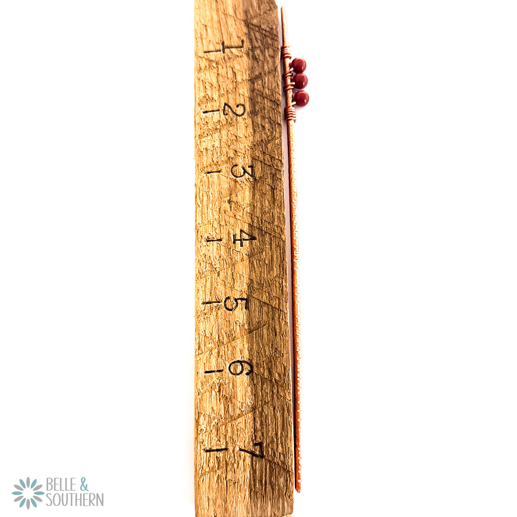 Red Jasper Copper Hair Stick next to ruler for measurement