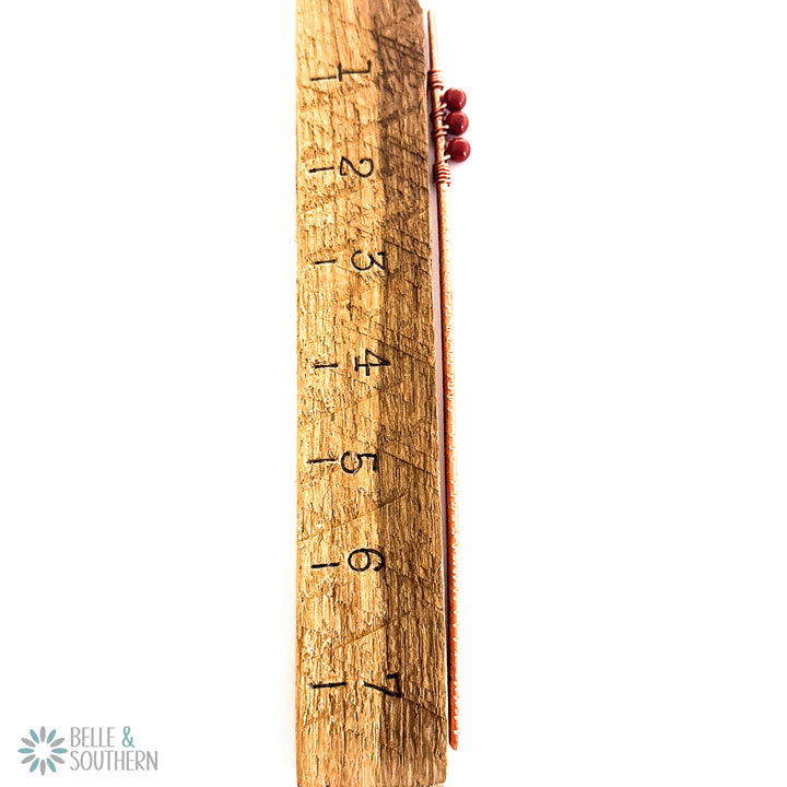 Red Jasper Copper Hair Stick next to ruler for measurement