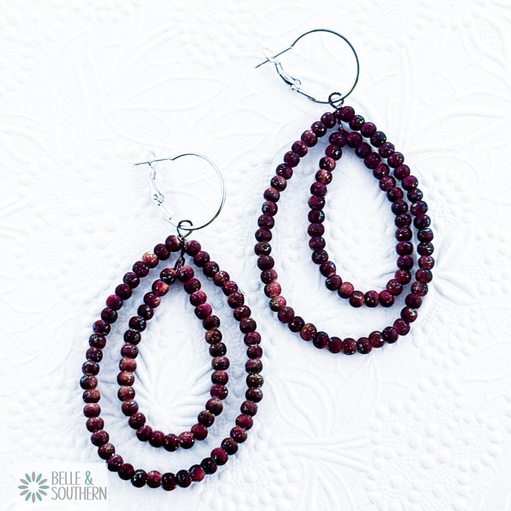 Cranberry Dyed Teakwood Hoop Earrings on white background