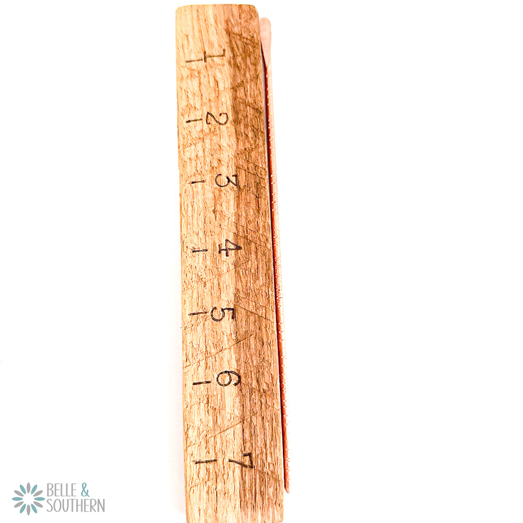 Textured Copper Hair Stick next to ruler to provide approx 7.5 in measurement
