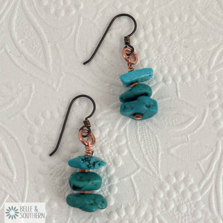 Teal the Deal Earrings stacked natural turquoise dangles on niobium ear wires, handcrafted by The Swanky Dale
