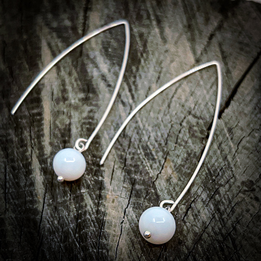 White Opal Glass Bead Silver Dangle Earrings on Barn wood 